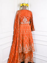Crepe Rust Peplum Lehenga Suit