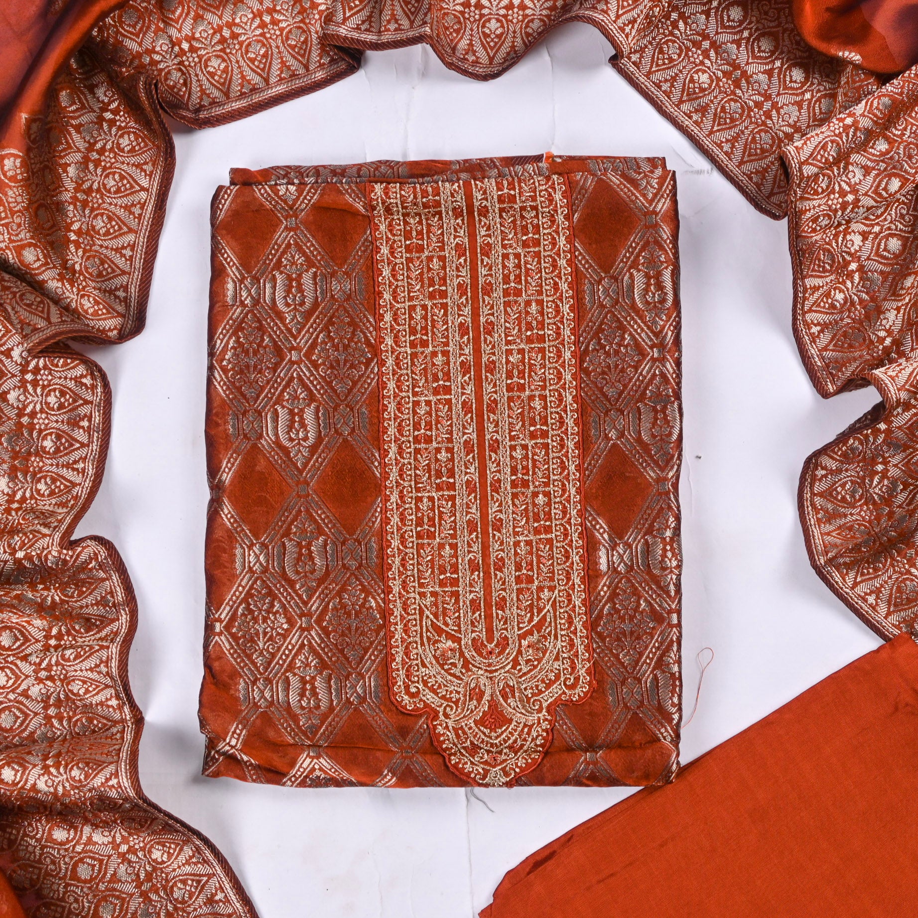 Banarasi Silk Rust Unstitched Suit