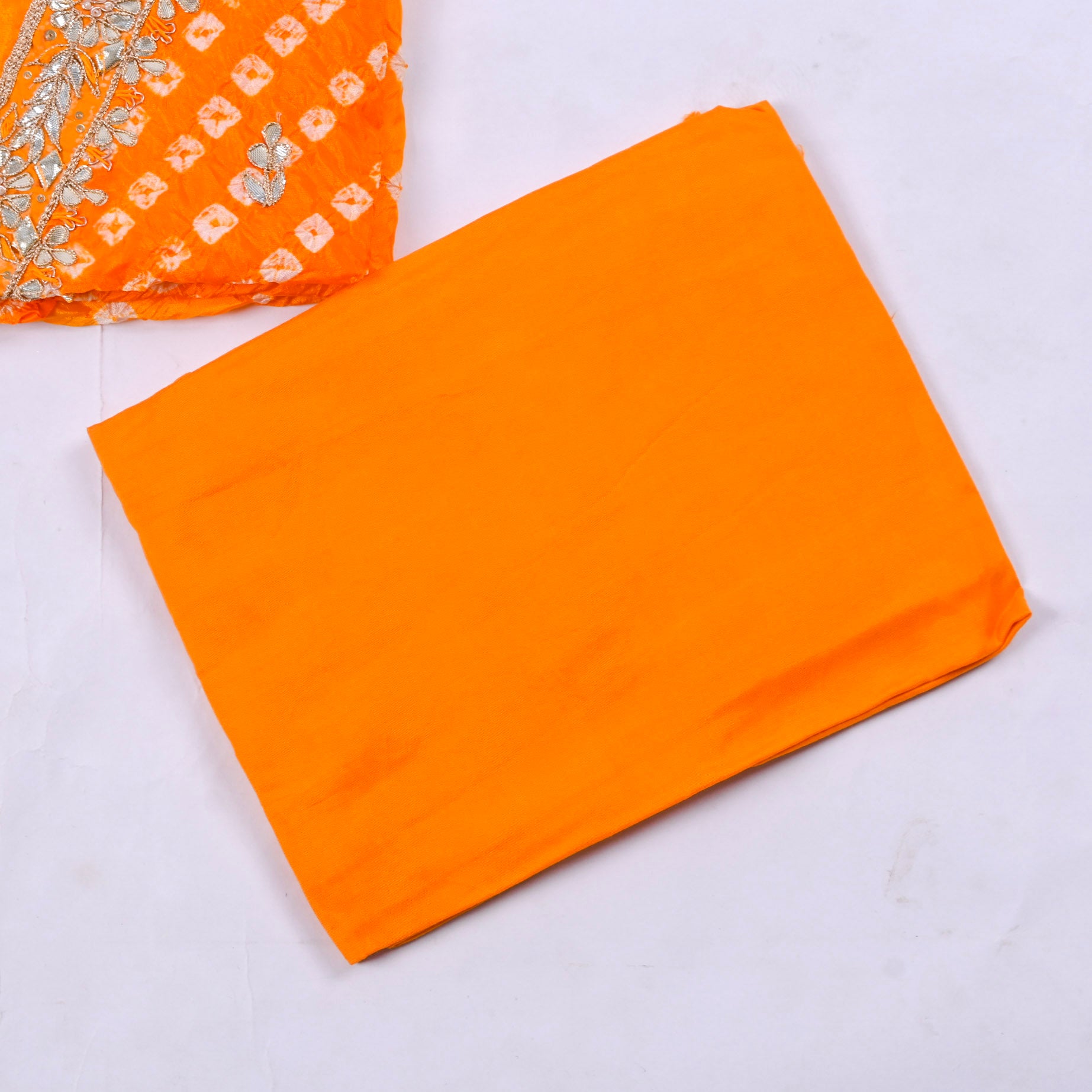 Muslin Orange Unstitched Suit