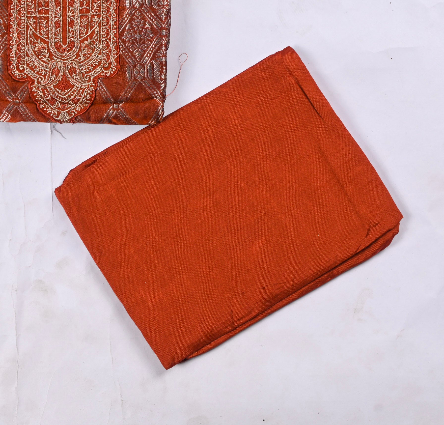 Banarasi Silk Rust Unstitched Suit